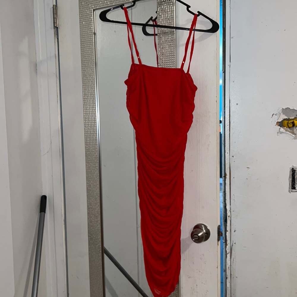 Red body con dress